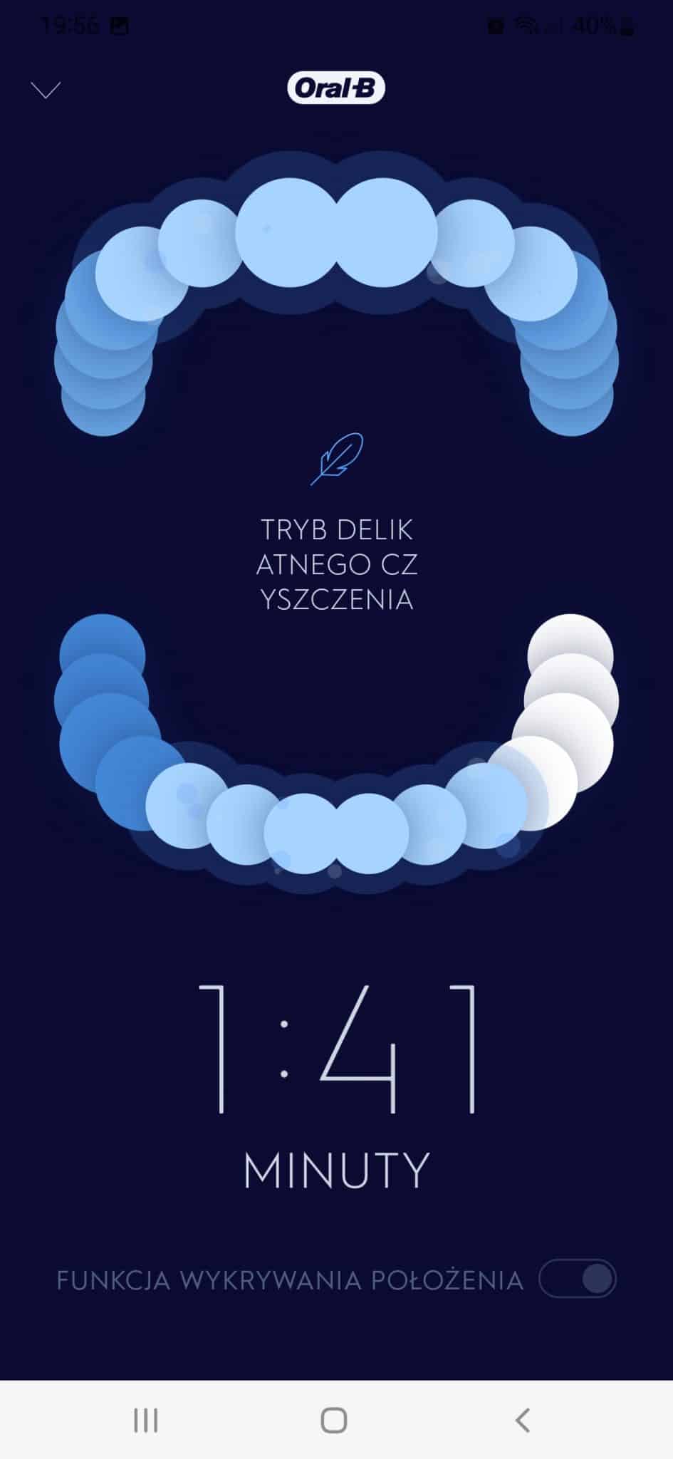 Zrzut ekranu z aplikacji mobilnej Oral-B z grafiką przedstawiajacą postępy czyszczenia zębów i timer